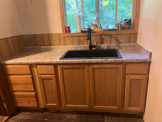 Custom built Kitchen sink with backsplash trim and window trim